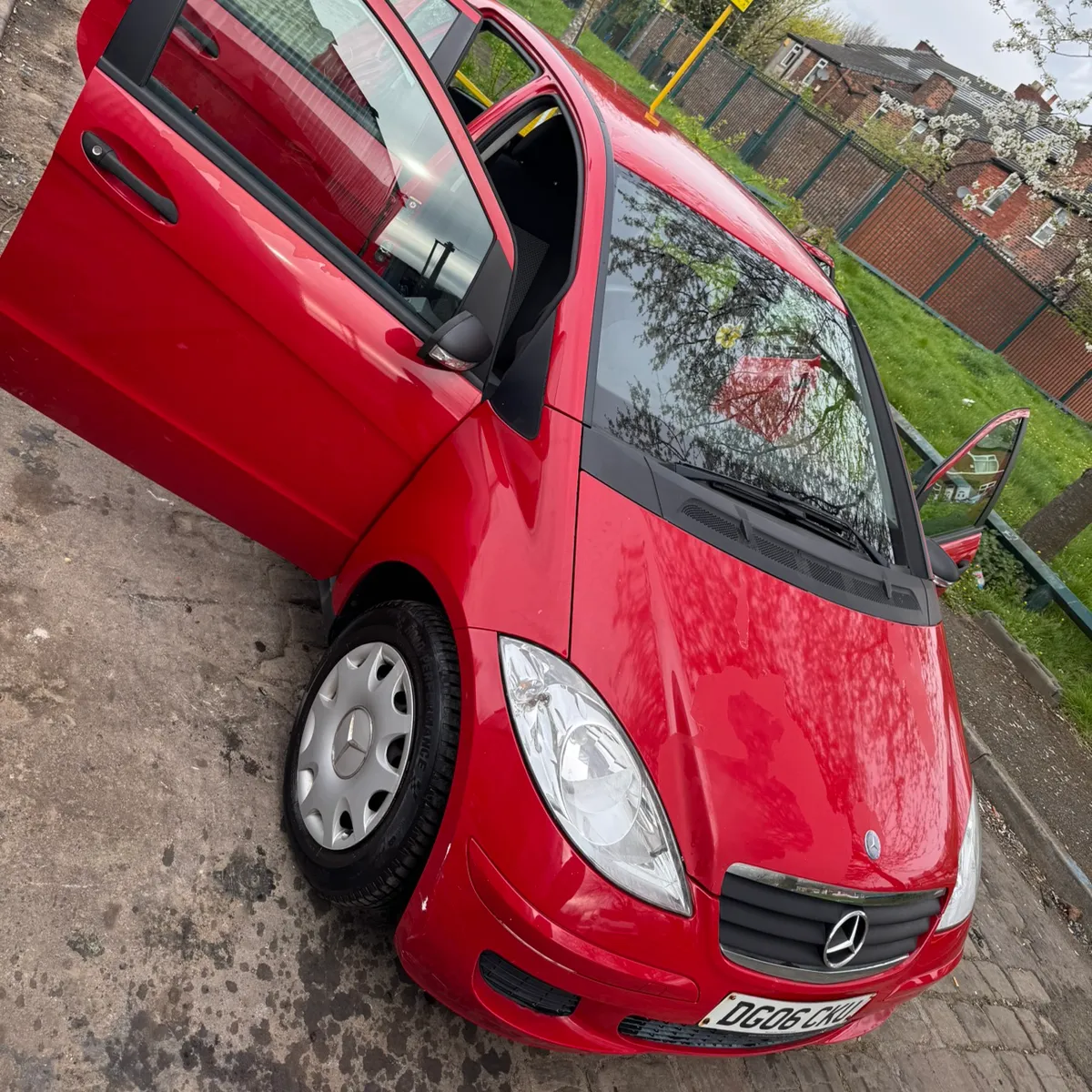 Compact red Mercedes-Benz car