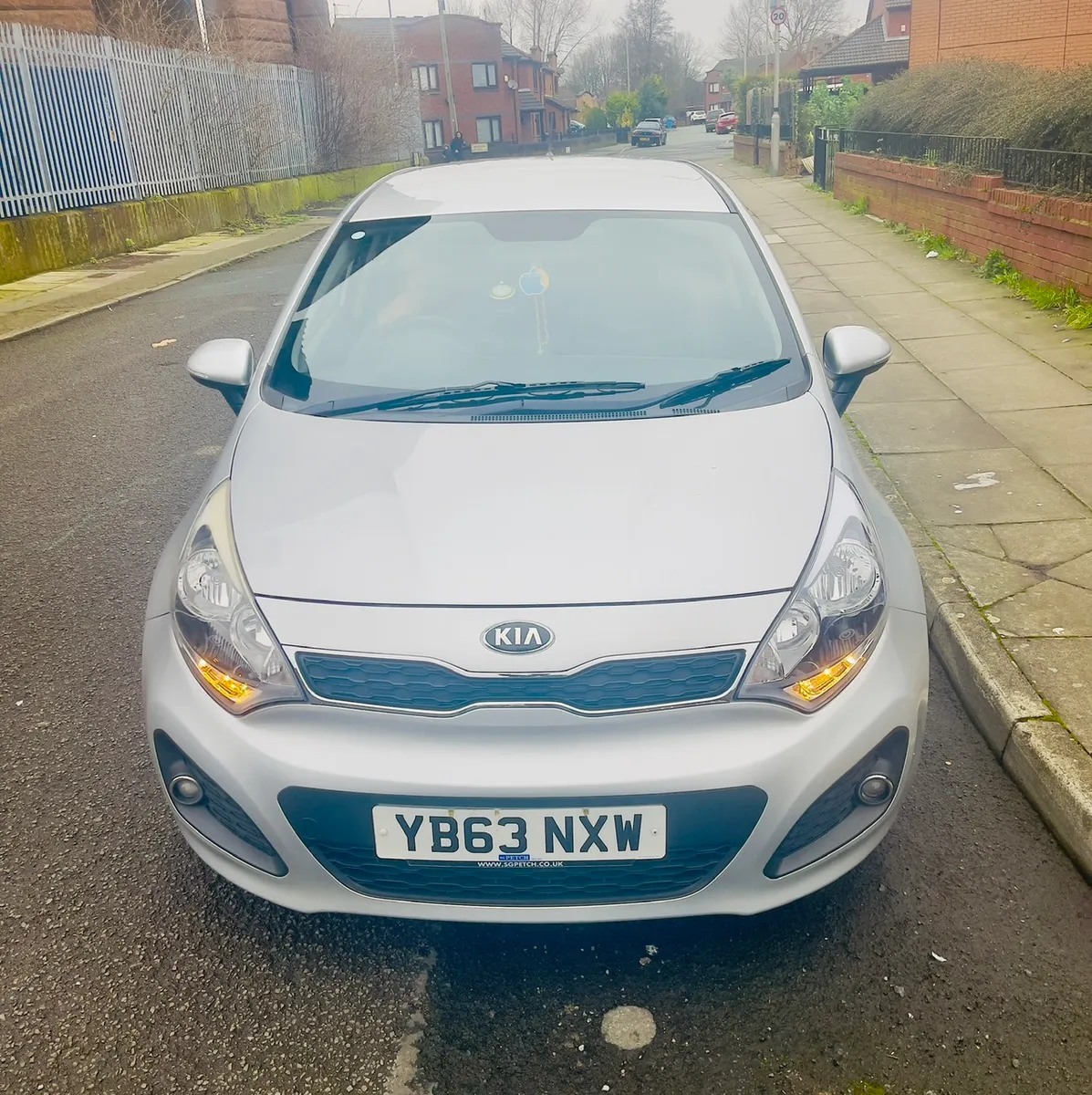 Silver Kia hatchback (manual, 5-door)